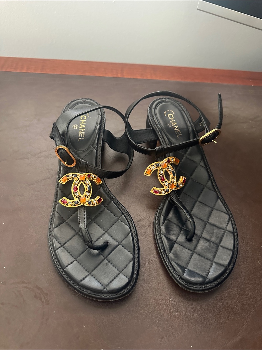 CHANEL Black Quilted Leather Toe-Loop Sandals with Gold CC Logo